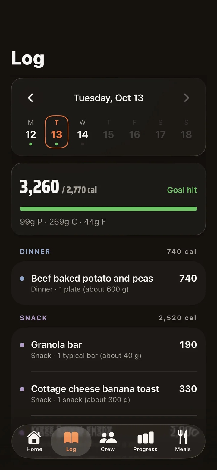 GAINR Log screen for a day with the calorie goal hit, listing dinner and snacks
